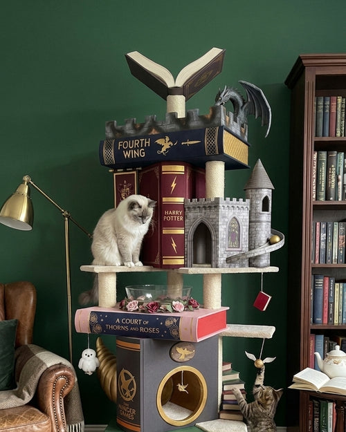 Nine Tales cat tower in a green reading room with two cats
